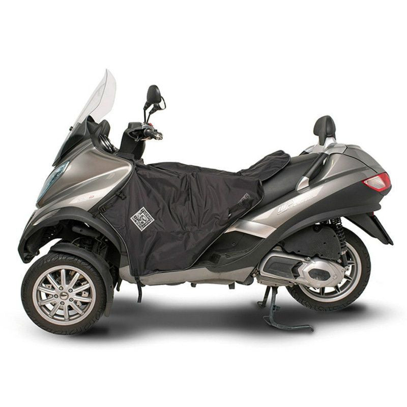 TABLIER TUCANO PIAGGIO 125 MP3 2006>, 250 MP3 2008>, 300 MP3 2012>, 400 MP3 2008>, 500 MP3 2010> (R062W-N) (TERMOSCUD) (SYSTEME ANTI-FLOTTEMENT SGAS)