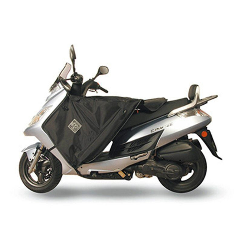 TABLIER TUCANO KYMCO 50-125-200 DINK 2006> (R065-X) (TERMOSCUD) (SYSTEME ANTI-FLOTTEMENT SGAS)